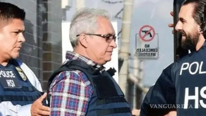 Royalty-Free photo: Man wearing sport shirt in front of question mark ...